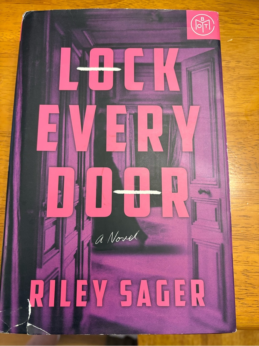 Lock Every Door by Riley Sager - Pink & Purple Hardcover Novel